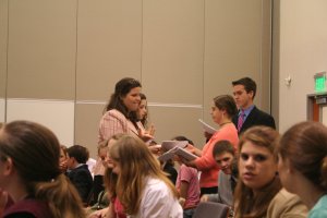TeenPact Staff handing out tests